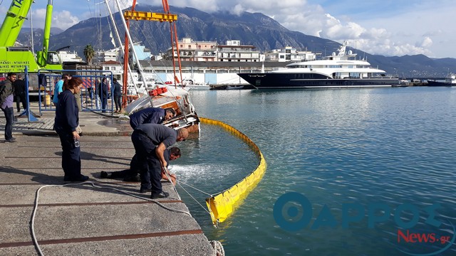 Μεγάλη επιχείρηση ανέλκυσης του μισοβυθισμένου σκάφους στο λιμάνι (φωτογραφίες)